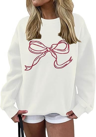 White crewneck sweatshirt with graphic for women